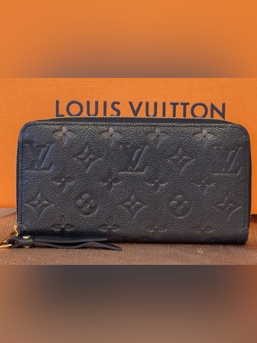 LV classic Empreinte leather embossed monogram Clemence wallet in Noir